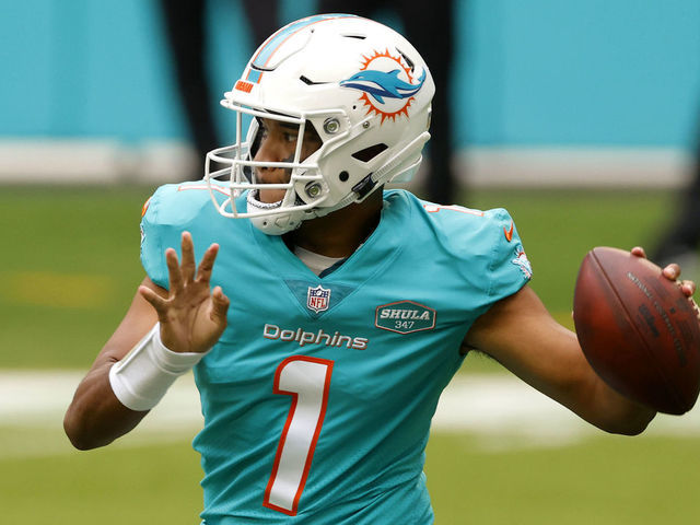 MIAMI GARDENS, FLORIDA - DECEMBER 06: Quarterback Tua Tagovailoa #1 of the Miami Dolphins looks to make a pass play in the first half of the game against the Cincinnati Bengals at Hard Rock Stadium on December 06, 2020 in Miami Gardens, Florida.
