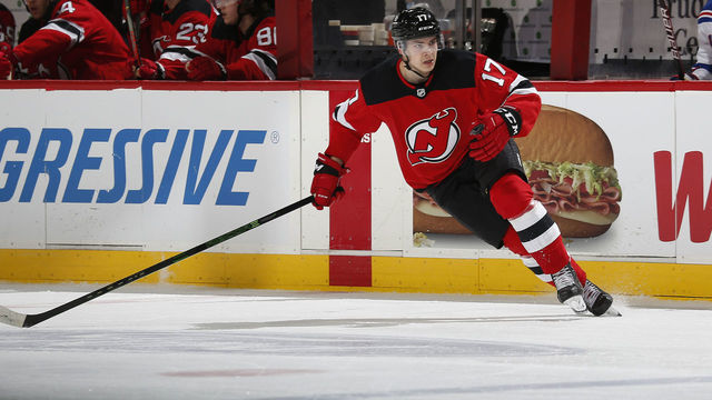 NEWARK, NJ - APRIL 18: Yegor Sharangovich #17 of the New Jersey Devils skates the New York Rangers during the third period at Prudential Center on April 18, 2021 in Newark, New Jersey.
