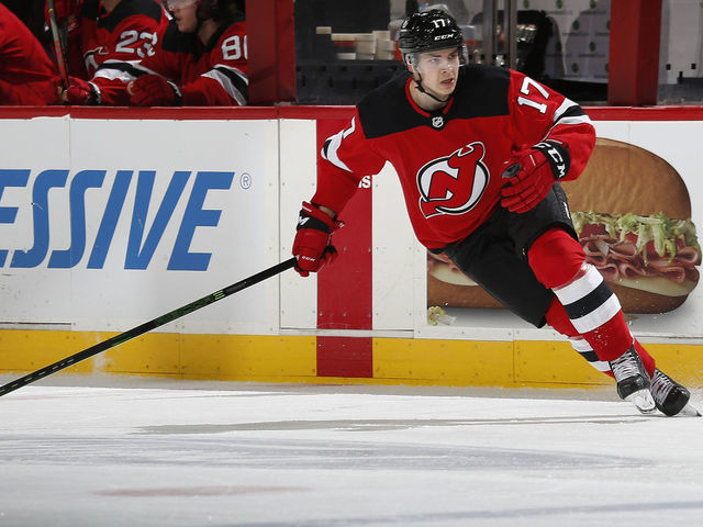 NEWARK, NJ - APRIL 18: Yegor Sharangovich #17 of the New Jersey Devils skates the New York Rangers during the third period at Prudential Center on April 18, 2021 in Newark, New Jersey.