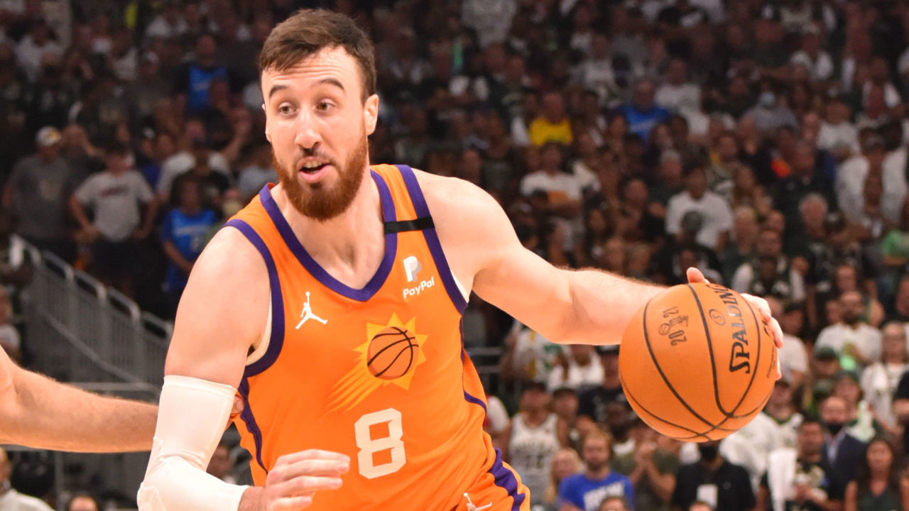 MILWAUKEE, WI - JULY 20: Frank Kaminsky #8 of the Phoenix Suns handles the ball against the Milwaukee Bucks during Game Six of the 2021 NBA Finals on July 20, 2021 at Fiserv Forum in Milwaukee, Wisconsin. NOTE TO USER: User expressly acknowledges and agrees that, by downloading and/or using this Photograph, user is consenting to the terms and conditions of the Getty Images License Agreement. Mandatory Copyright Notice: Copyright 2021 NBAE