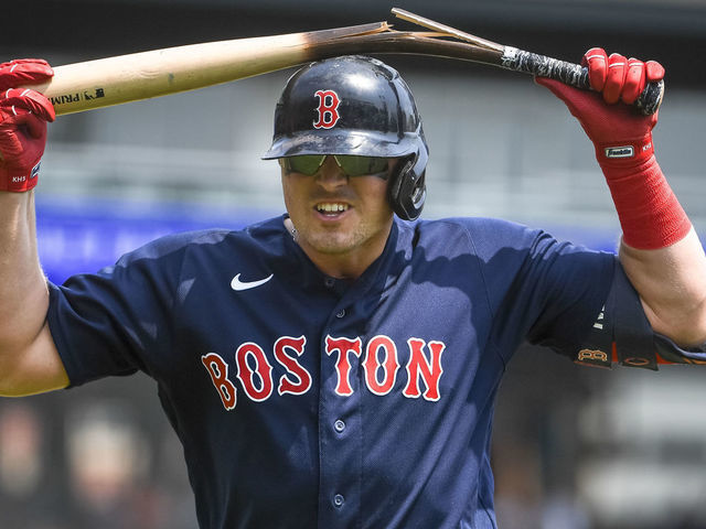 Hunter Renfroe of the Boston Red Sox breaks a baseball hat over