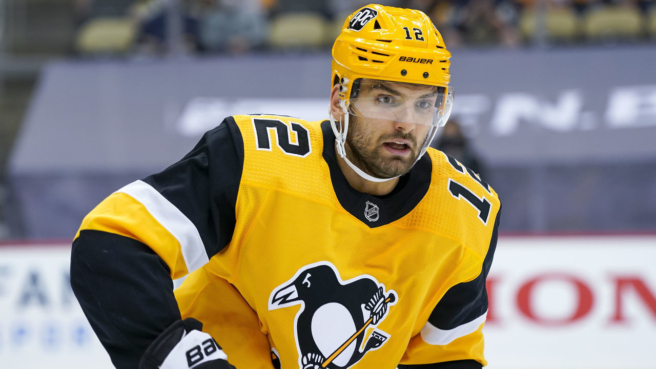 PITTSBURGH, PA - MAY 18: Pittsburgh Penguins center Zach Aston-Reese (12) looks on during the third period in Game Two of the First Round in the 2021 NHL Stanley Cup Playoffs between the New York Islanders and the Pittsburgh Penguins on May 18, 2021, at PPG Paints Arena in Pittsburgh, PA.