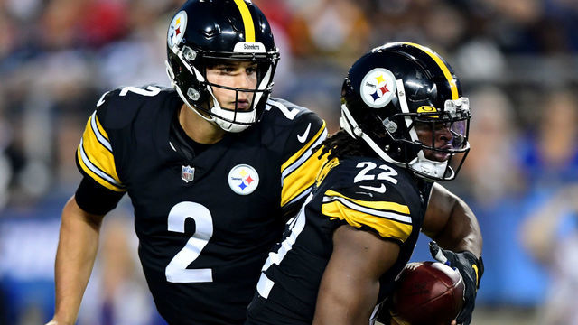 CANTON, OHIO - AUGUST 5: Mason Rudolph #2 of the Pittsburgh Steelers hands the ball off to Najee Harris #22 in the first half during the 2021 NFL preseason Hall of Fame Game against the Dallas Cowboys at Tom Benson Hall Of Fame Stadium on August 5, 2021 in Canton, Ohio.
