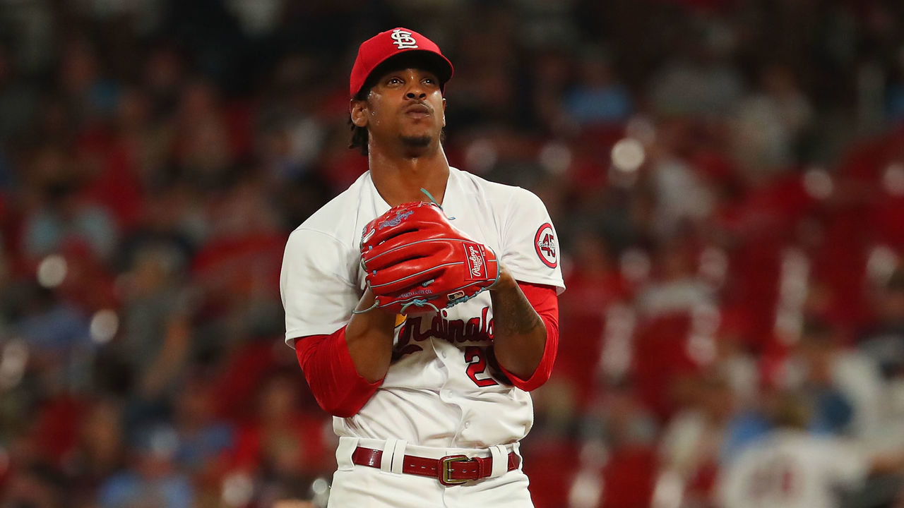 ST LOUIS, MO - AUGUST 05: Alex Reyes #29 of the St. Louis Cardinals reacts after walking three consecutive batters against the Atlanta Braves in the eighth inning at Busch Stadium on August 5, 2021 in St Louis, Missouri.