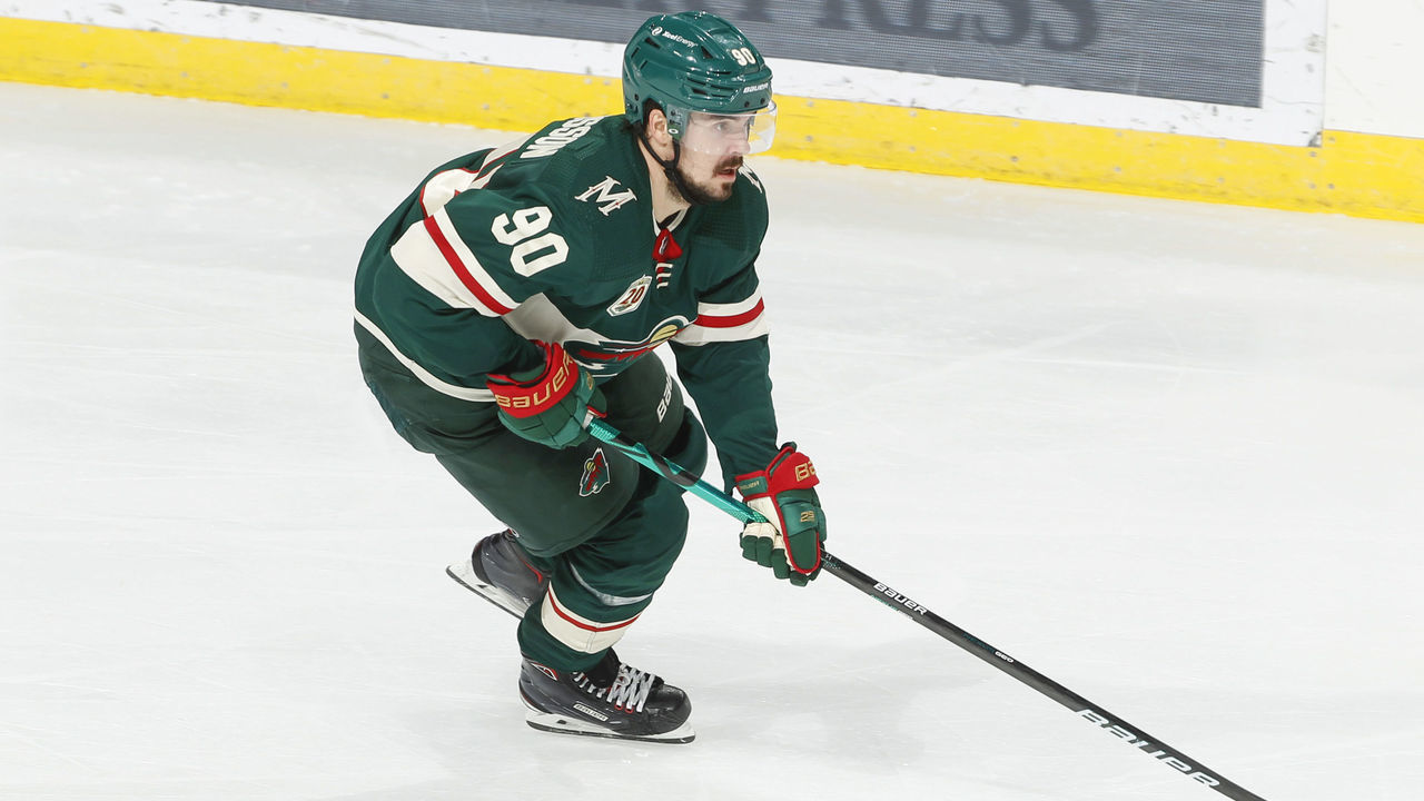 SAINT PAUL, MN - APRIL 5: Marcus Johansson #90 of the Minnesota Wild skates with the puck against the Colorado Avalanche during the game at the Xcel Energy Center on April 5, 2021 in Saint Paul, Minnesota.