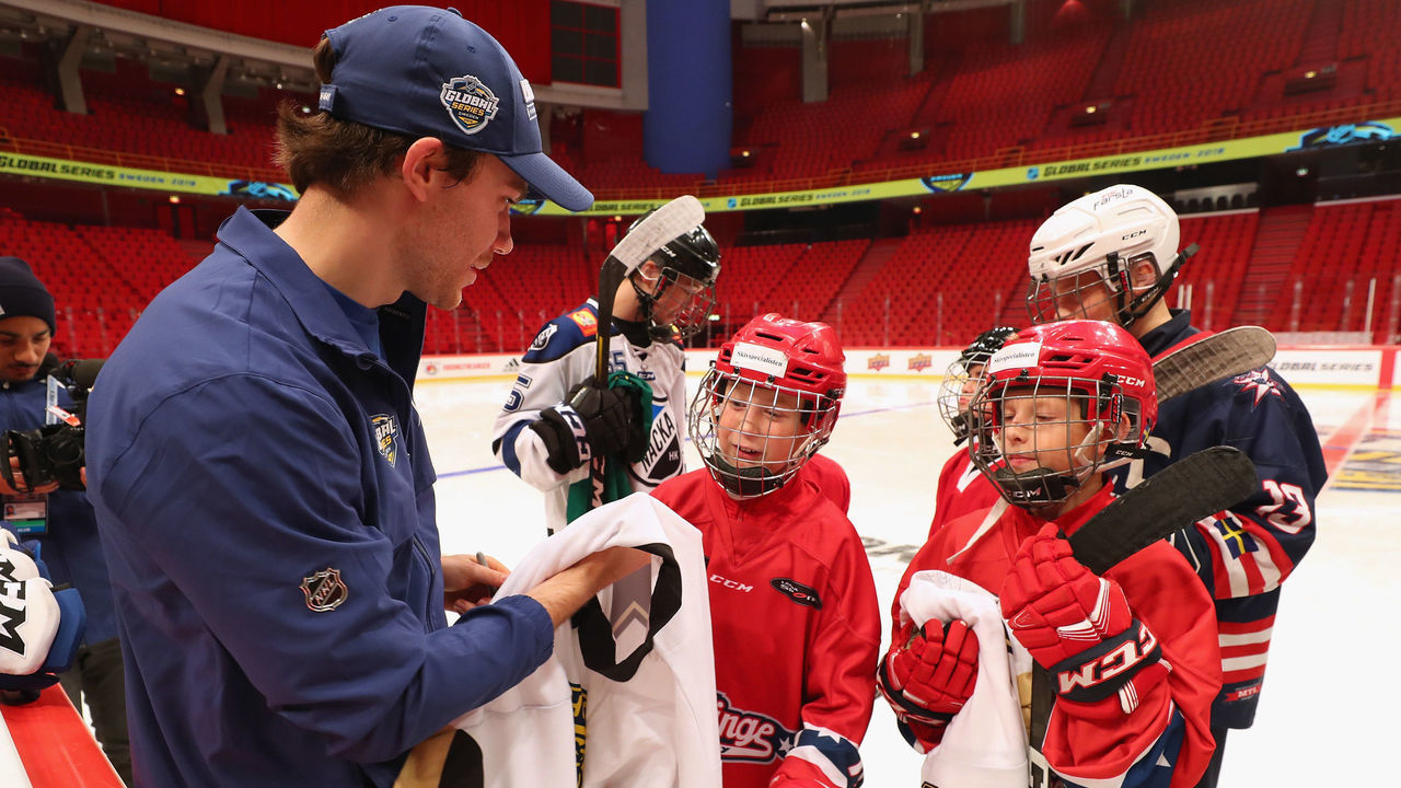 STOCKHOLM, SWEDEN - NOVEMBER 4: Brayden Point of the Tampa Bay Lightning signs autographs for young players at the Stockholm Ice Hockey Federation Youth Initiative on-ice session with Buffalo Sabres and Tampa Bay Lightning players at Ericsson Globe on November 4, 2019 in Stockholm, Sweden. The event was also sponsored by the NHLPA Goals & Dreams program.