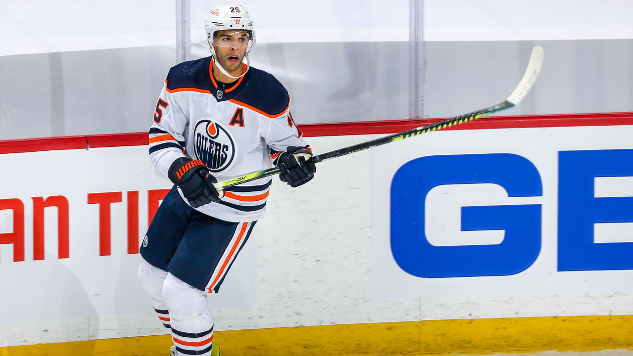 WINNIPEG, MB - MAY 23: Darnell Nurse #25 of the Edmonton Oilers keeps an eye on the play during first period action against the Winnipeg Jets in Game Three of the First Round of the 2021 Stanley Cup Playoffs at Bell MTS Place on May 23, 2021 in Winnipeg, Manitoba.