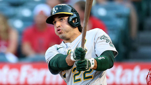 ANAHEIM, CALIFORNIA - JULY 29: Ramon Laureano #22 of the Oakland Athletics hits a double against the Los Angeles Angels in the first inning at Angel Stadium of Anaheim on July 29, 2021 in Anaheim, California.