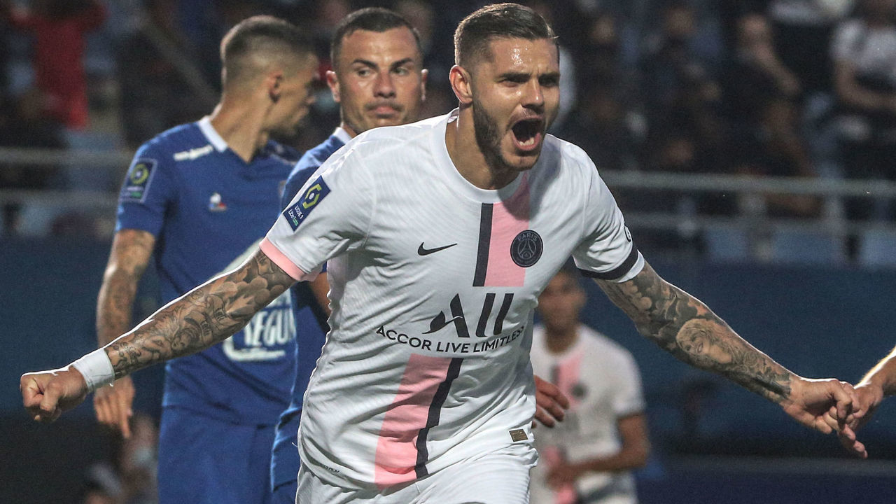 Paris Saint-Germain's Argentinian forward Mauro Icardi celebrates after scoring a goal during the French L1 football match between Paris Saint-Germain (PSG) and ES Troyes at the Stade de l'Aube in Troyes on August 7, 2021.