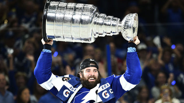 TAMPA, FLORIDA - JULY 07: Pat Maroon #14 of the Tampa Bay Lightning hoists the Stanley Cup after their 1-0 win in Game Five of the 2021 Stanley Cup Final to win the series four games to one against the Montreal Canadiens at Amalie Arena on July 07, 2021 in Tampa, Florida.