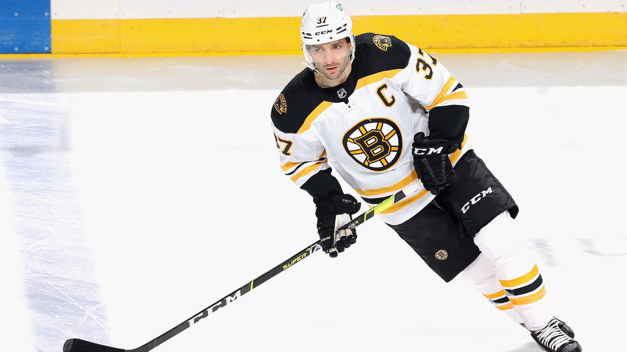 NEWARK, NEW JERSEY - MAY 04: Patrice Bergeron #37 of the Boston Bruins skates against the New Jersey Devils at the Prudential Center on May 04, 2021 in Newark, New Jersey.