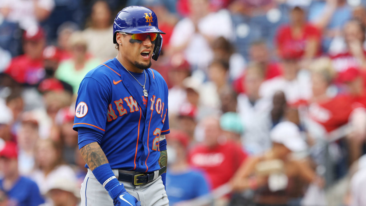 PHILADELPHIA, PA - AUGUST 08: Javier Baez #23 of the New York Mets reacts after injuring himself on a swing against the Philadelphia Phillies during the fifth inning of a game at Citizens Bank Park on August 8, 2021 in Philadelphia, Pennsylvania.