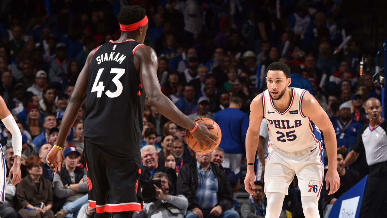 PHILADELPHIA, PA - DECEMBER 8: Ben Simmons #25 of the Philadelphia 76ers plays defense against Pascal Siakam #43 of the Toronto Raptors on December 8, 2019 at the Wells Fargo Center in Philadelphia, Pennsylvania NOTE TO USER: User expressly acknowledges and agrees that, by downloading and/or using this Photograph, user is consenting to the terms and conditions of the Getty Images License Agreement. Mandatory Copyright Notice: Copyright 2019 NBAE