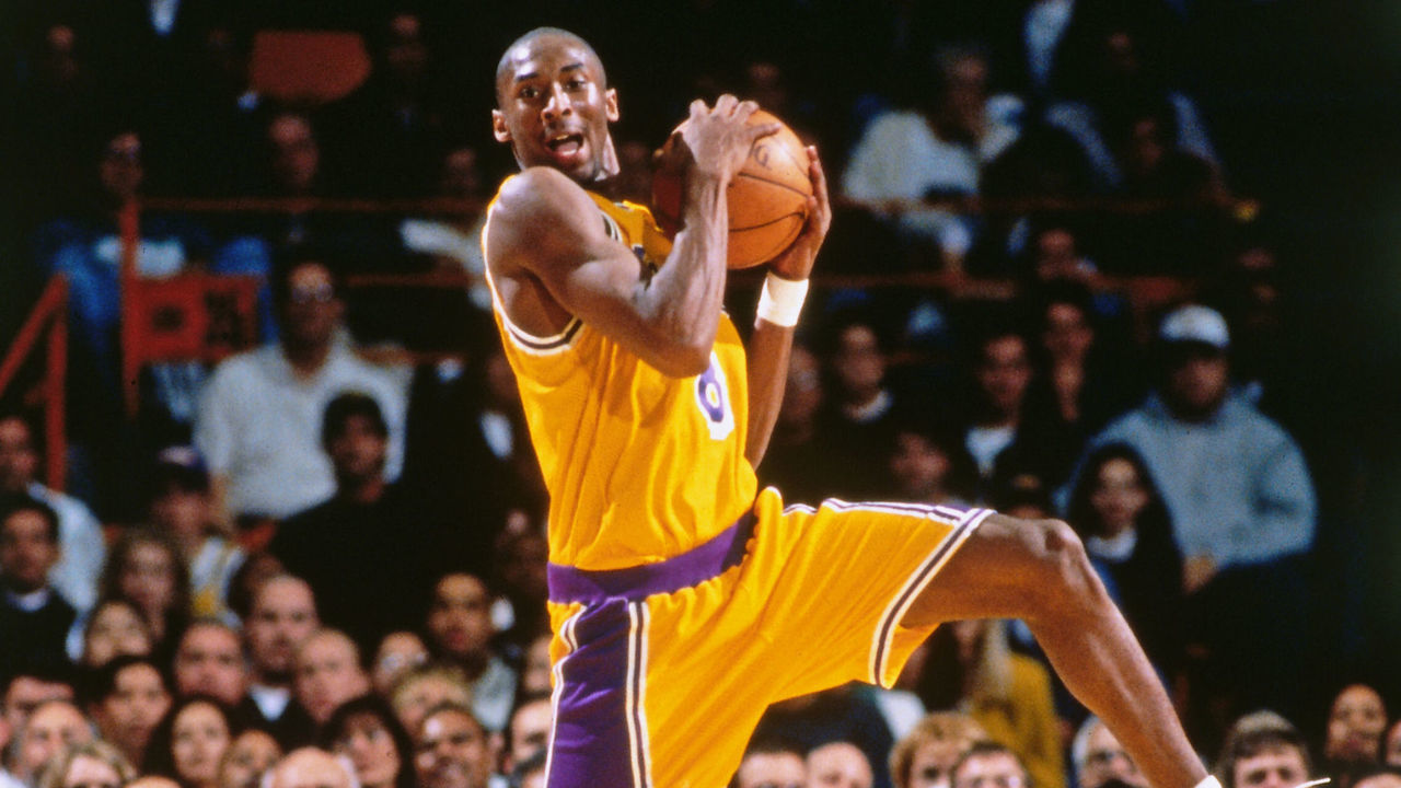 INGLEWOOD, CA - NOVEMBER 3: Kobe Bryant #8 of the Los Angeles Lakers rebounds against the Minnesota Timberwolves in his first regular season game on November 3, 1996 at The Forum in Inglewood, California. NOTE TO USER: User expressly acknowledges and agrees that, by downloading and/or using this Photograph, user is consenting to the terms and conditions of the Getty Images License Agreement. Mandatory Copyright Notice: Copyright 1996 NBAE