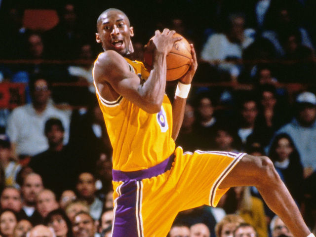 INGLEWOOD, CA - NOVEMBER 3: Kobe Bryant #8 of the Los Angeles Lakers rebounds against the Minnesota Timberwolves in his first regular season game on November 3, 1996 at The Forum in Inglewood, California. NOTE TO USER: User expressly acknowledges and agrees that, by downloading and/or using this Photograph, user is consenting to the terms and conditions of the Getty Images License Agreement. Mandatory Copyright Notice: Copyright 1996 NBAE