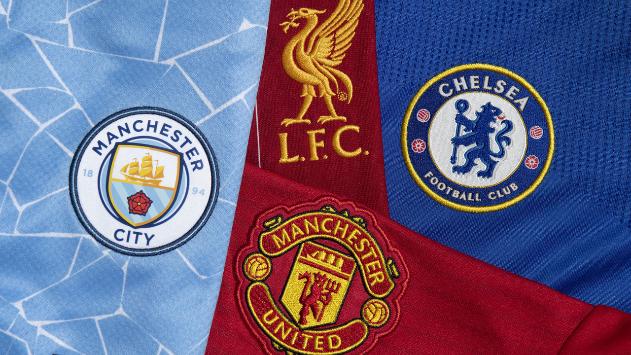 MANCHESTER, ENGLAND - JUNE 16: The club badges of the four Premier League teams in the 2021/22 UEFA Champions League Manchester City, Liverpool, Manchester United and Chelsea on their home shirts on June 16, 2021 in Manchester, United Kingdom.