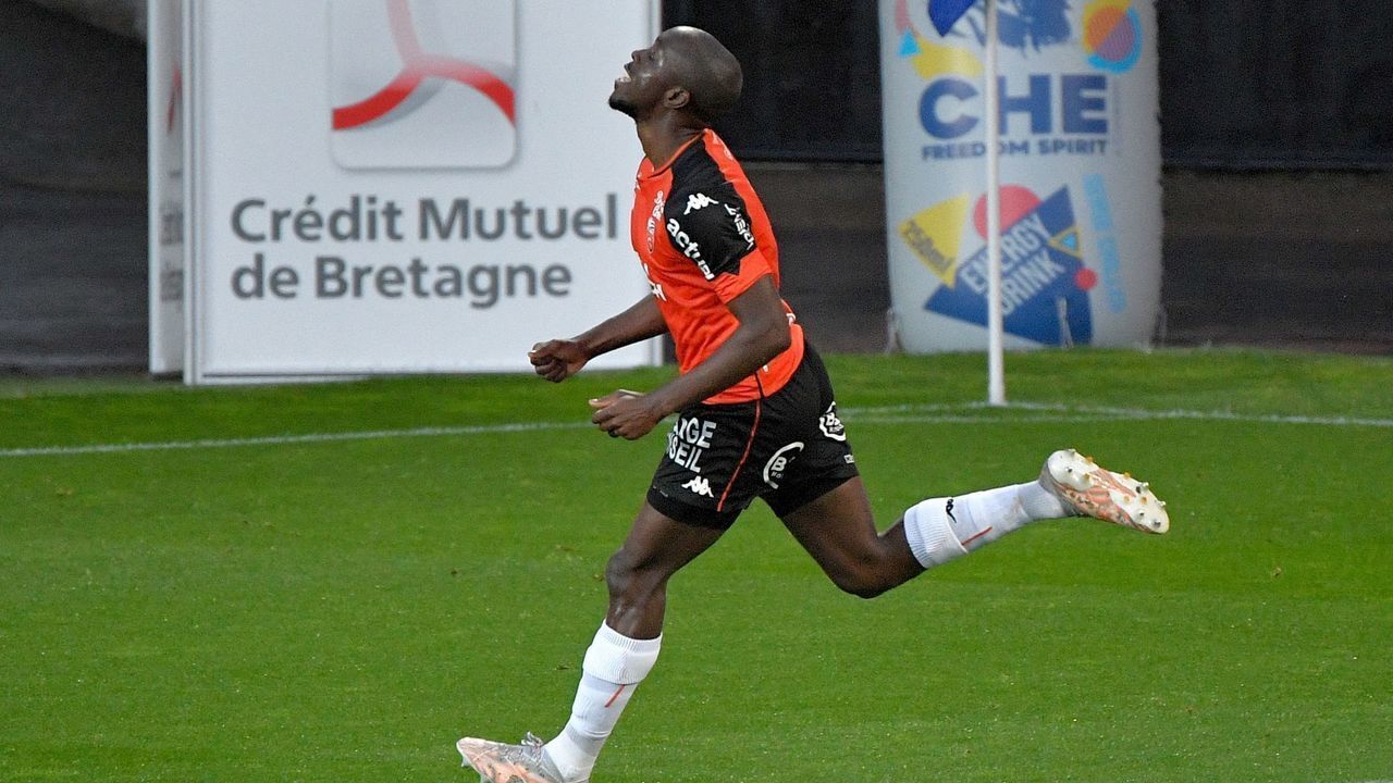 Lorient's French forward Yoane Wissa celebrates after scoring a penalty kick during the French L1 football match between FC Lorient and FC Metz at the Moustoir stadium in Lorient, north-western France on May 16, 2021.