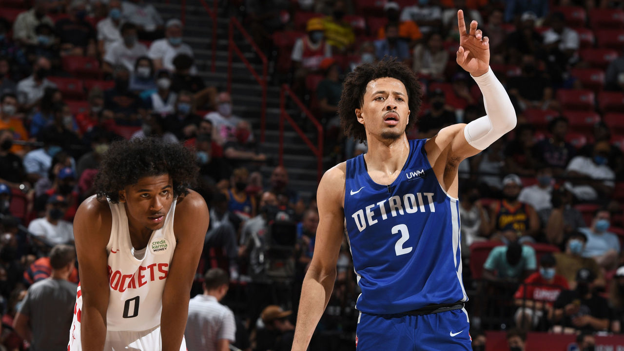 LAS VEGAS, NV - AUGUST 10: Jalen Green #0 of the Houston Rockets and Cade Cunningham #2 of the Detroit Pistons look on during the 2021 Las Vegas Summer League on August 10, 2021 at the Thomas & Mack Center in Las Vegas, Nevada. NOTE TO USER: User expressly acknowledges and agrees that, by downloading and/or using this Photograph, user is consenting to the terms and conditions of the Getty Images License Agreement. Mandatory Copyright Notice: Copyright 2021 NBAE