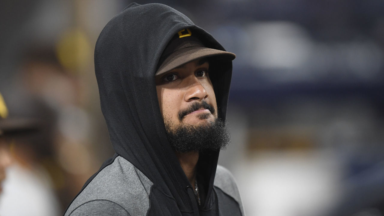SAN DIEGO, CA - AUGUST 9: Fernando Tatis Jr. #23 of the San Diego Padres looks on from the dugout during the eighth inning of a baseball game against the Miami Marlins at Petco Park on August 9, 2021 in San Diego, California.
