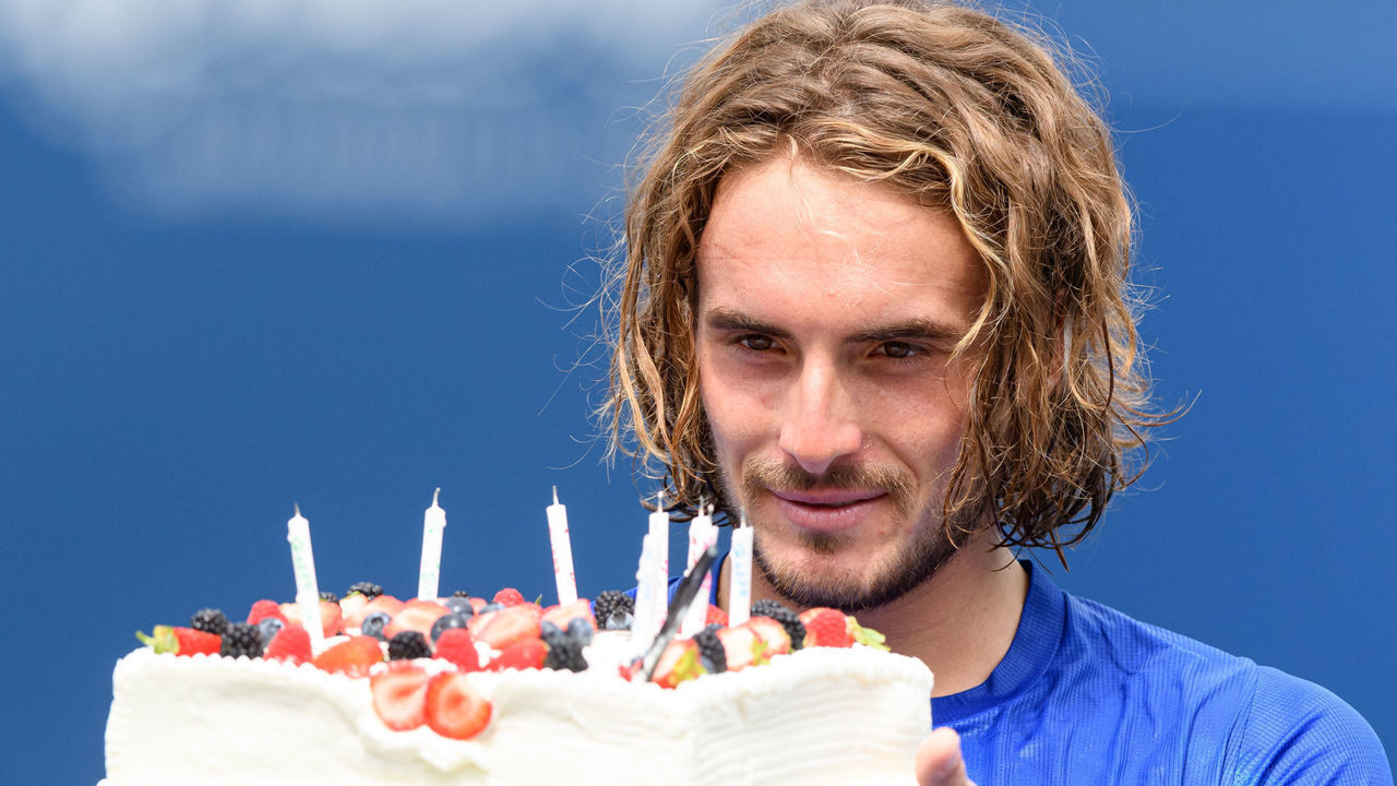 TORONTO, ON - AUGUST 12: Stefanos Tsitsipas (GRE) receives a cake for his birthday after his National Bank Open tennis tournament third round game on August 12, 2021, at Aviva Centre in Toronto, ON, Canada.