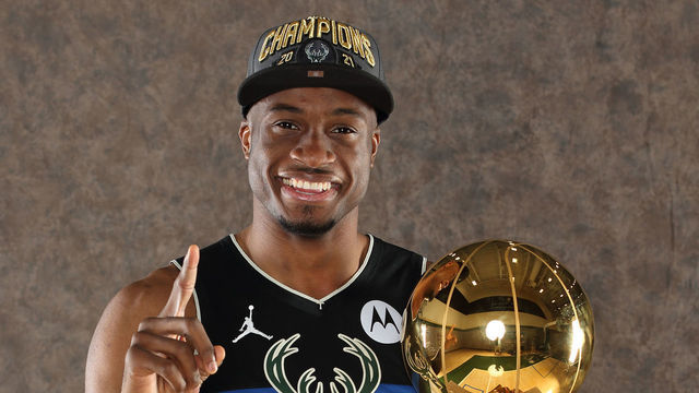 MILWAUKEE, WI - JULY 30: Thanasis Antetokounmpo #43 of the Milwaukee Bucks poses with the Larry O'Brien NBA Championship Trophy at the Froedtert & the Medical College of Wisconsin Sports Science Center on July 30, 2021 in Milwaukee, Wisconsin. Mandatory Copyright Notice: Copyright 2021 NBAE