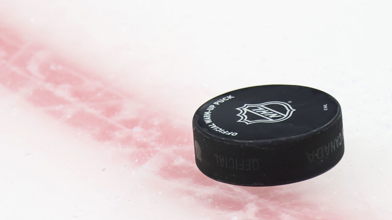 UNIONDALE, NEW YORK - MAY 20: A puck sits on the ice during warm-ups prior to the game between the New York Islanders and the Pittsburgh Penguins in Game Three of the First Round of the 2021 Stanley Cup Playoffs at the Nassau Coliseum on May 20, 2021 in Uniondale, New York. The Penguins defeated the Islanders 5-4.