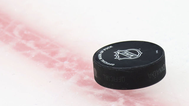 UNIONDALE, NEW YORK - MAY 20: A puck sits on the ice during warm-ups prior to the game between the New York Islanders and the Pittsburgh Penguins in Game Three of the First Round of the 2021 Stanley Cup Playoffs at the Nassau Coliseum on May 20, 2021 in Uniondale, New York. The Penguins defeated the Islanders 5-4.