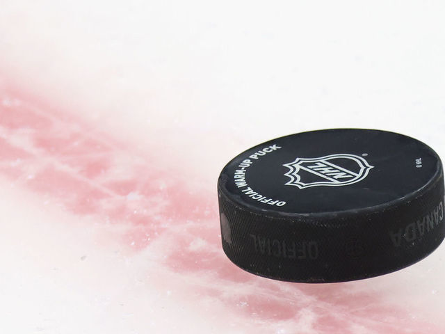 UNIONDALE, NEW YORK - MAY 20: A puck sits on the ice during warm-ups prior to the game between the New York Islanders and the Pittsburgh Penguins in Game Three of the First Round of the 2021 Stanley Cup Playoffs at the Nassau Coliseum on May 20, 2021 in Uniondale, New York. The Penguins defeated the Islanders 5-4.