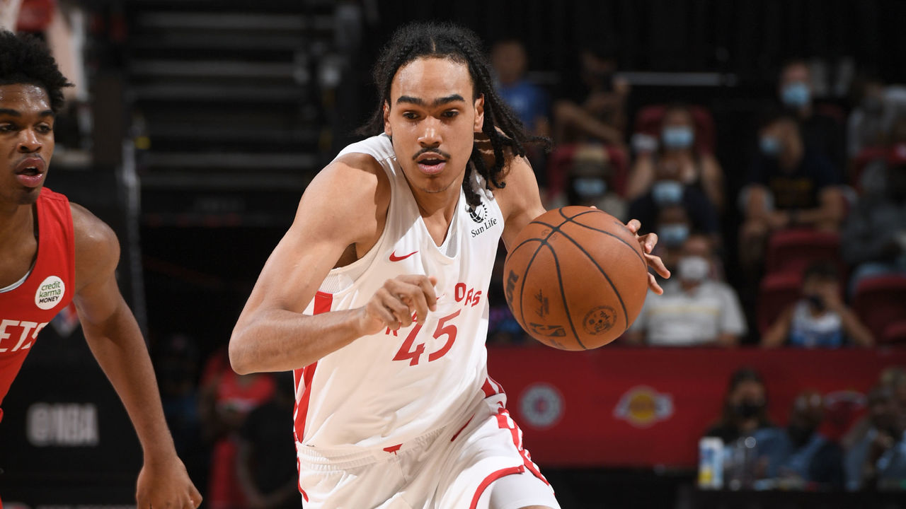 LAS VEGAS, NV - AUGUST 12: Dalano Banton #45 of the Toronto Raptors dribbles the ball against the Houston Rockets during the 2021 Las Vegas Summer League on August 12, 2021 at the Thomas & Mack Center in Las Vegas, Nevada. Mandatory Copyright Notice: Copyright 2021 NBAE