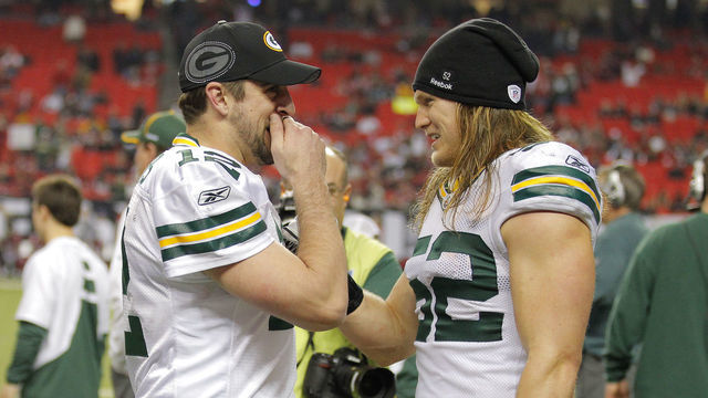 15 January 2011: Green Bay Packers quarterback Aaron Rodgers (12) and linebacker Clay Matthews (52) share some laughs as the clock counts down in the Green Bay Packers 48-21 victory over the Atlanta Falcons in the NFC Divisional playoff at the Georgia Dome in Atlanta Georgia.