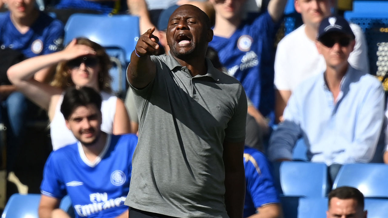 Crystal Palace's French manager Patrick Vieira gestures during the English Premier League football match between Chelsea and Crystal Palace at Stamford Bridge in London on August 14, 2021. - RESTRICTED TO EDITORIAL USE. No use with unauthorized audio, video, data, fixture lists, club/league logos or 'live' services. Online in-match use limited to 120 images. An additional 40 images may be used in extra time. No video emulation. Social media in-match use limited to 120 images. An additional 40 images may be used in extra time. No use in betting publications, games or single club/league/player publications.