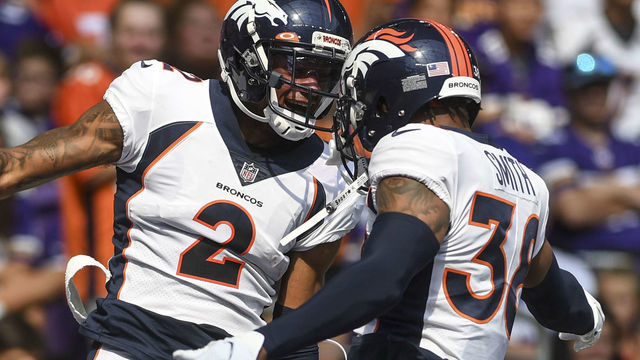 MINNEAPOLIS , MN - AUGUST 14: Pat Surtain II (2) of the Denver Broncos celebrates with Saivion Smith (38) after returning an interception for a touchdown against the Minnesota Vikings during the first half at U.S. Bank Stadium on Saturday, August 14, 2021.