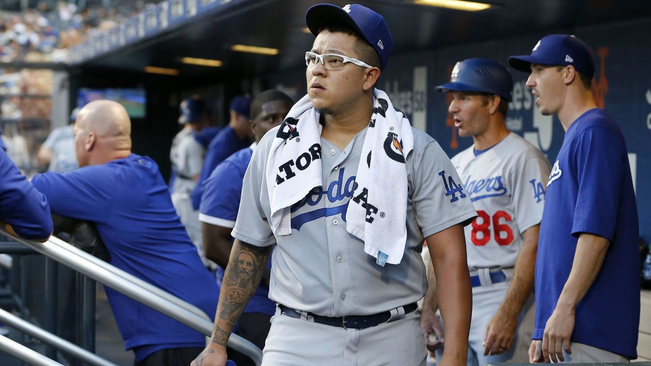 NEW YORK, NEW YORK - AUGUST 13: Julio Urias #7 of the Los Angeles Dodgers looks on before a game against the New York Mets at Citi Field on August 13, 2021 in New York City. The Dodgers defeated the Mets 6-5 in ten innings.