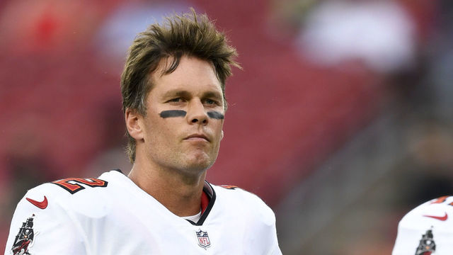 TAMPA, FLORIDA - AUGUST 14: Tom Brady #12 of the Tampa Bay Buccaneers looks on prior to the game against the Cincinnati Bengals during a preseason game at Raymond James Stadium on August 14, 2021 in Tampa, Florida.