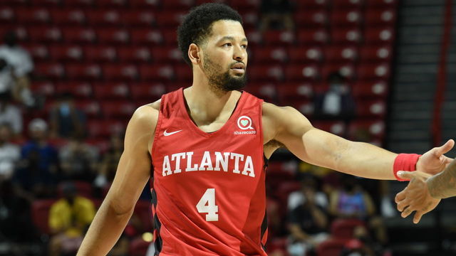 LAS VEGAS, NV - AUGUST 14: Skylar Mays #4 of the Atlanta Hawks hi-fives teammates during the game against the Miami Heat during the 2021 Las Vegas Summer League on August 14, 2021 at the Thomas & Mack Center in Las Vegas, Nevada. NOTE TO USER: User expressly acknowledges and agrees that, by downloading and/or using this Photograph, user is consenting to the terms and conditions of the Getty Images License Agreement. Mandatory Copyright Notice: Copyright 2021 NBAE