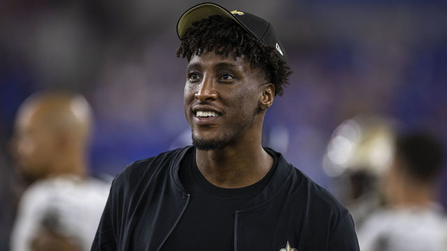 BALTIMORE, MD - AUGUST 14: Michael Thomas #13 of the New Orleans Saints looks on from the sidelines during the second half of a preseason game against the Baltimore Ravens at M&T Bank Stadium on August 14, 2021 in Baltimore, Maryland.
