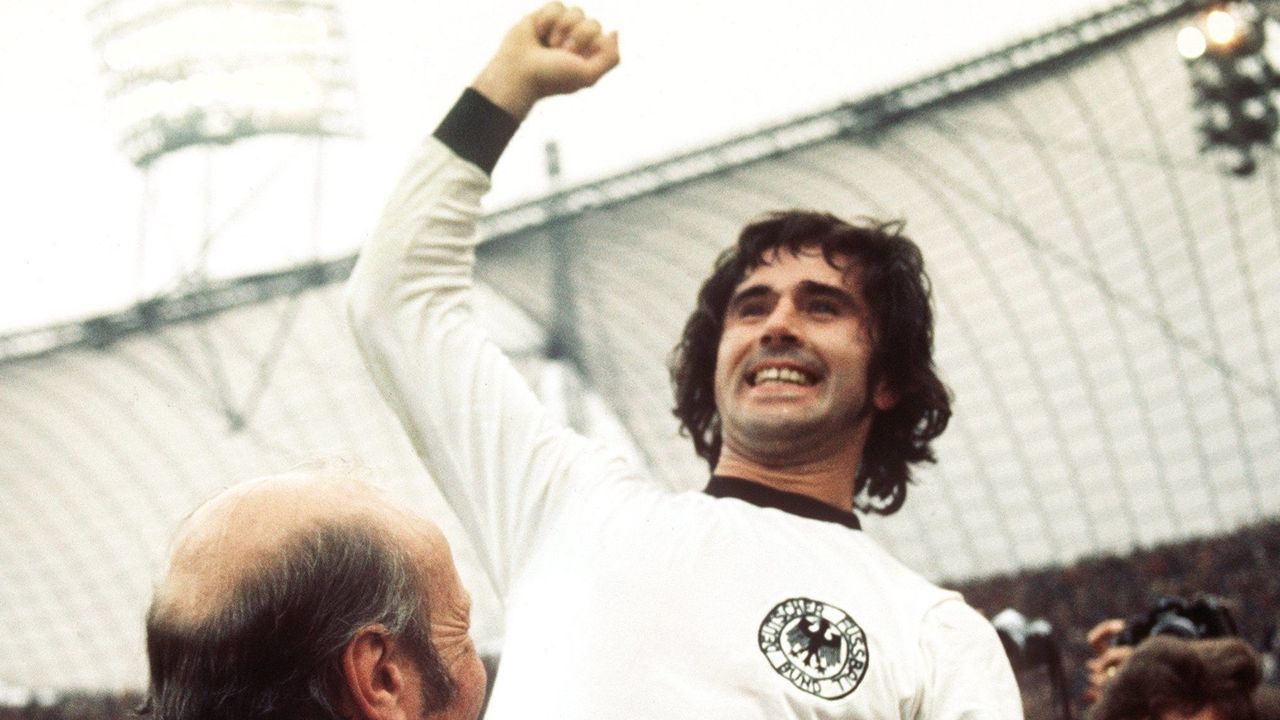 After the final whistle German forward Gerd Mueller raises his right fist in triumph. Coach Helmut Schoen joins the celebration. After numerous dramatic situations and great pressure from the Dutch team in the second half, the German team prevailed and won the World Cup final on 07 July 1974 in Munich, Germmany by a score of 2-1. Keywords: Sport, SPO, Sport, SPO, People, soccer, gesture, smiling, celebrating, cheering