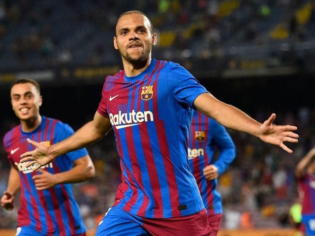 Barcelona's Danish forward Martin Braithwaite celebrates after scoring his second goal during the Spanish League football match between Barcelona and Real Sociedad at the Camp Nou stadium in Barcelona on August 15, 2021.