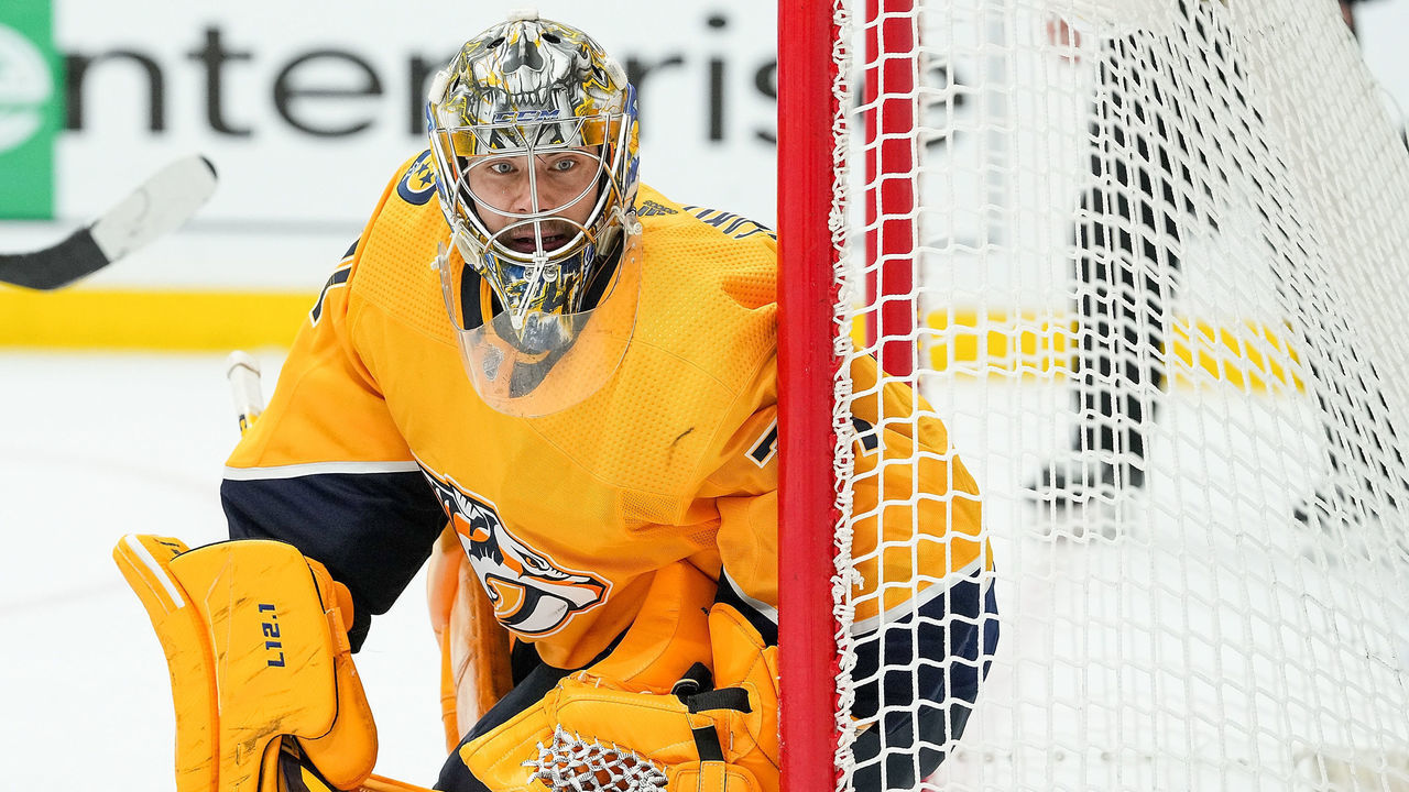 NASHVILLE, TN - MAY 23: Juuse Saros #74 of the Nashville Predators tends net against the Carolina Hurricanes in Game Four of the First Round of the 2021 Stanley Cup Playoffs at Bridgestone Arena on May 23, 2021 in Nashville, Tennessee.