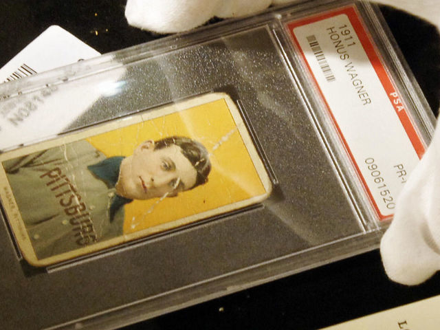 NEW YORK, UNITED STATES: A rare baseball card of Honus Wagner of the Pittsburgh Pirates, considered to be the best all around player in baseball history, is displayed at a preview of a sports memorabilia sale, 03 June, 2005, at Sotheby's in New York. The estimate for the 10 June sale of the card is 90,000 to 120,000 USD. AFP PHOTO/Stan HONDA