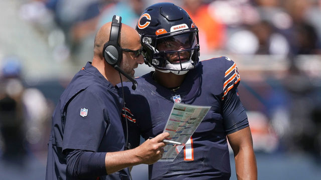 CHICAGO, IL - AUGUST 14: Chicago Bears quarterback Justin Fields (1) reviews plays with Chicago Bears head coach Matt Nagy during a preseason game between the Chicago Bears and the Miami Dolphins on August 14, 2021 at Soldier Field in Chicago, IL.