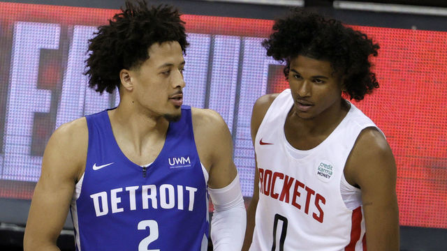 LAS VEGAS, NEVADA - AUGUST 10: Cade Cunningham #2 of the Detroit Pistons and Jalen Green #0 of the Houston Rockets wait for the start of their game during the 2021 NBA Summer League at the Thomas & Mack Center on August 10, 2021 in Las Vegas, Nevada.