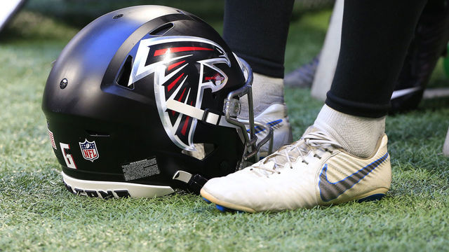 ATLANTA, GA - AUGUST 13: A Falcons helmet on the sidelines during the Friday night preseason NFL game between the Atlanta Falcons and the Tennessee Titans on August 13, 2021 at Mercedes-Benz Stadium in Atlanta, Georgia.