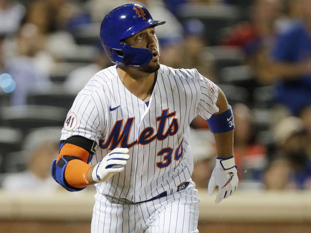 NEW YORK, NEW YORK - AUGUST 14: Michael Conforto #30 of the New York Mets watches the flight of his fourth inning home run against the Los Angeles Dodgers at Citi Field on August 14, 2021 in New York City.
