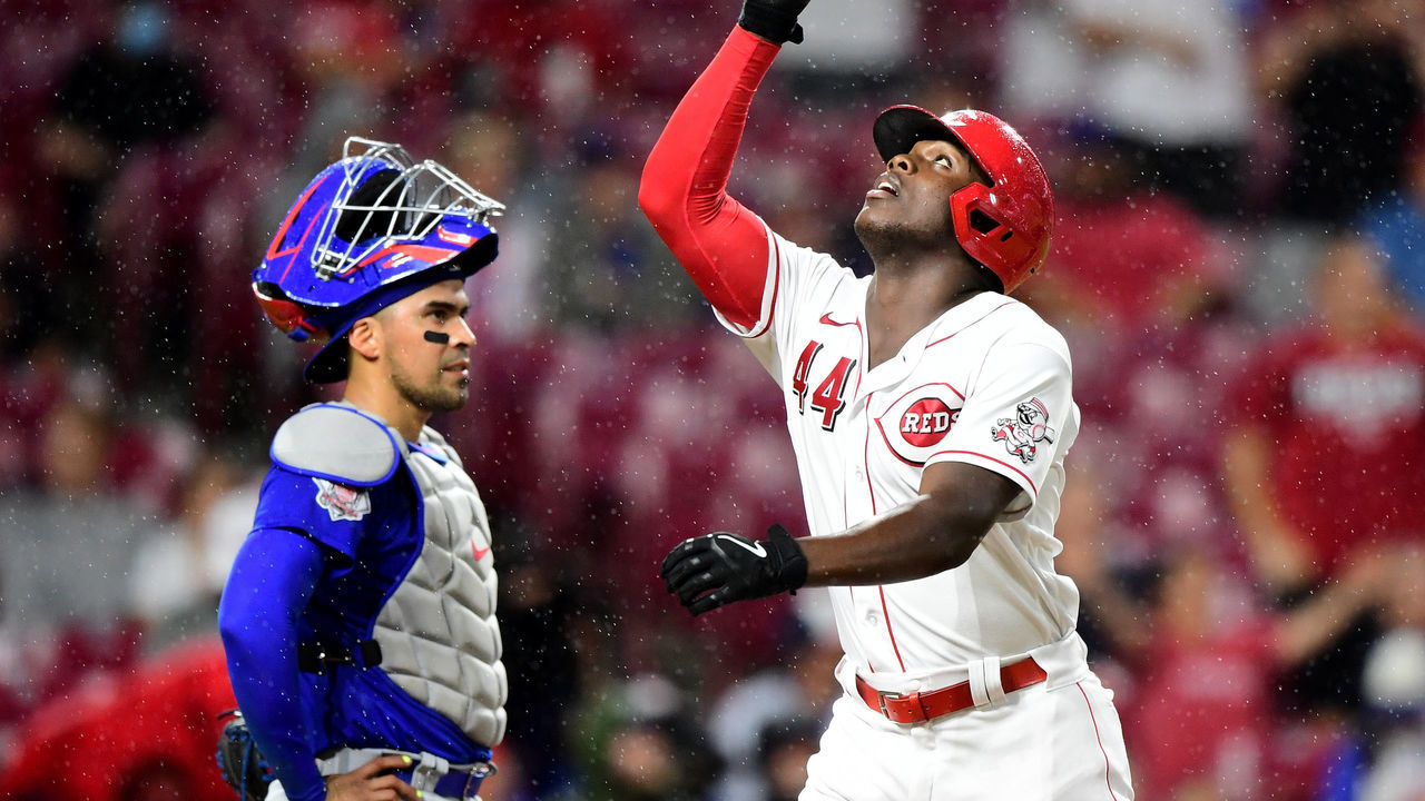 CINCINNATI, OHIO - AUGUST 16: Aristides Aquino #44 of the Cincinnati Reds celebrates his two-run home run in the fifth inning during their game against the Chicago Cubs at Great American Ball Park on August 16, 2021 in Cincinnati, Ohio.