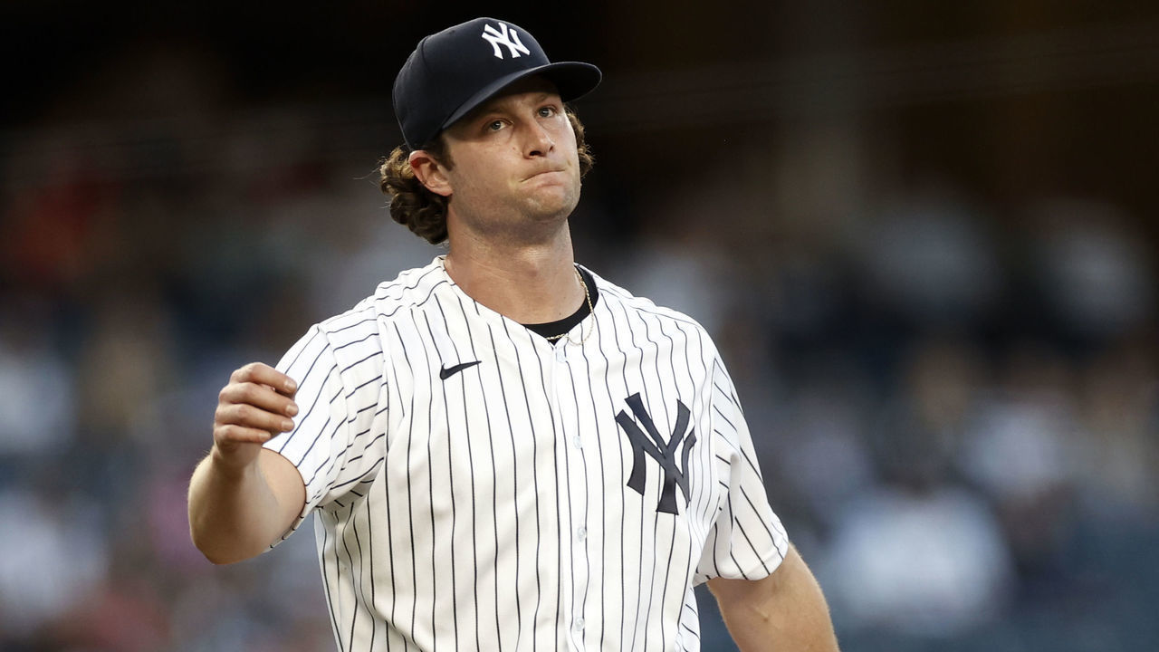 NEW YORK, NY - AUGUST 16: Gerrit Cole #45 of the New York Yankees reacts after giving up a solo home run to Justin Upton #10 of the Los Angeles Angels during the first inning at Yankee Stadium on August 16, 2021 in New York City.