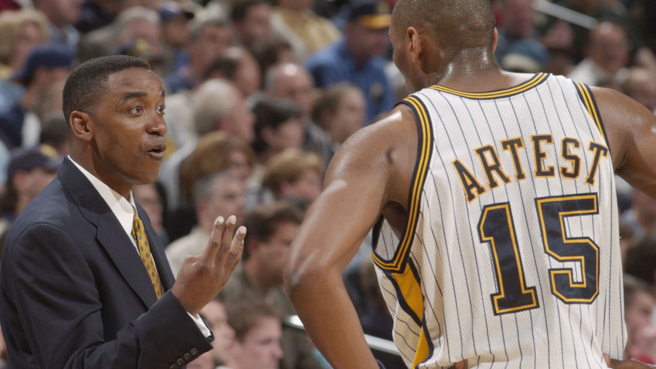INDIANAPOLIS - APRIL 30: Head coach Isiah Thomas of the Indiana Pacers instructs guard Ron Artest #15 during game four of the Eastern Conference Quarterfinals against the New Jersey Nets during the 2002 NBA Playoffs at Conseco Fieldhouse in Indianapolis, Indiana on April 30, 2002. The Pacers won 97-74. NOTE TO USER: User expressly acknowledges and agrees that, by downloading and/or using this Photograph, User is consenting to the terms and conditions of the Getty Images License Agreement Mandatory Copyright Notice: Copyright 2002 NBAE