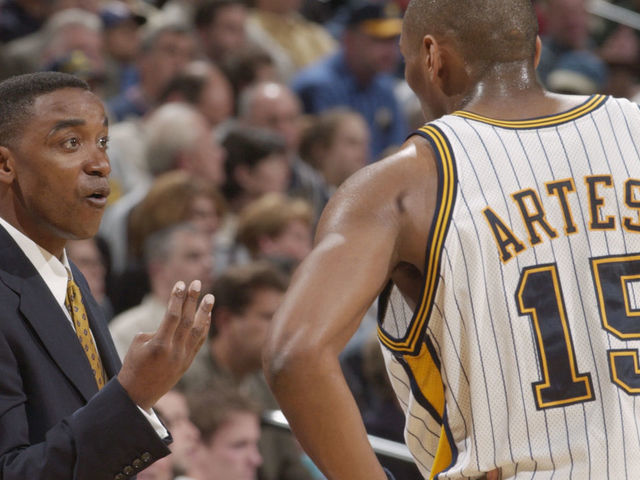 INDIANAPOLIS - APRIL 30: Head coach Isiah Thomas of the Indiana Pacers instructs guard Ron Artest #15 during game four of the Eastern Conference Quarterfinals against the New Jersey Nets during the 2002 NBA Playoffs at Conseco Fieldhouse in Indianapolis, Indiana on April 30, 2002. The Pacers won 97-74. NOTE TO USER: User expressly acknowledges and agrees that, by downloading and/or using this Photograph, User is consenting to the terms and conditions of the Getty Images License Agreement Mandatory Copyright Notice: Copyright 2002 NBAE