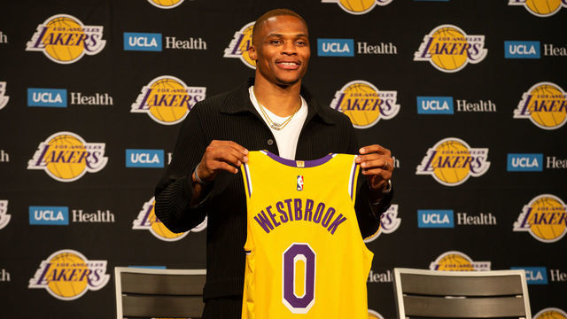 LOS ANGELES, CA - AUGUST 10: Russell Westbrook poses with 0 jersey during the Los Angeles Lakers Introductory press conference for Russell Westbrook on August 10, 2021, at Staples Center in Los Angeles, CA.