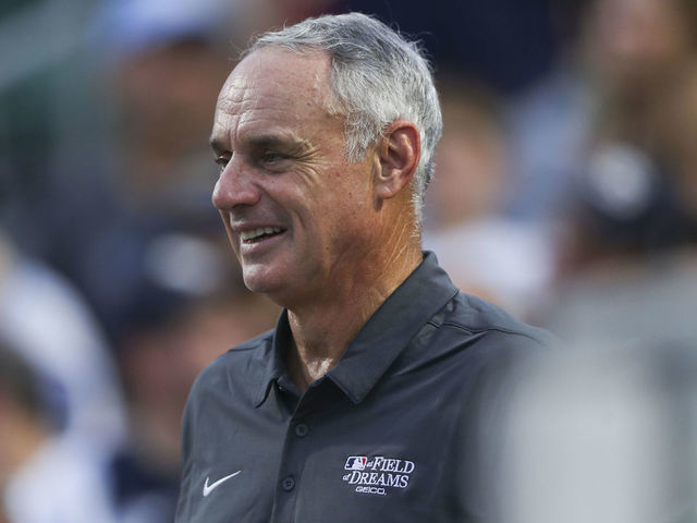 DYERSVILLE, IL - AUGUST 12: Major League Baseball Commissioner Rob Manfred stands during the game between the New York Yankees and the Chicago White Sox at MLB Field at Field of Dreams on Thursday, August 12, 2021 in Dyersville, Iowa.